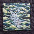 Artistic depiction of a deer skeleton on a textured green and blue background